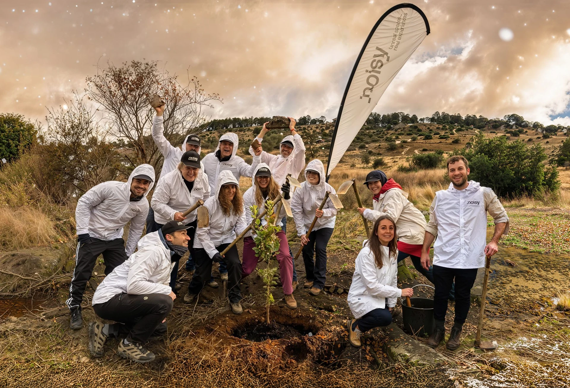The noisy team beside the tree planted during the Bosque Noisy day